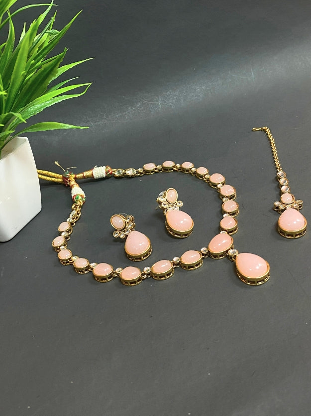 Elegant Pink Stone Gold-Plated Necklace, Earrings & Maang Tikka Jewellery Set