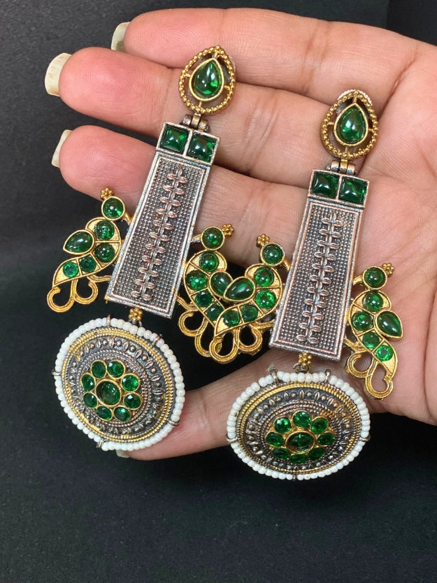 Oxidized Dual Tone Jhoomar Earrings with Green Kundan Stones
