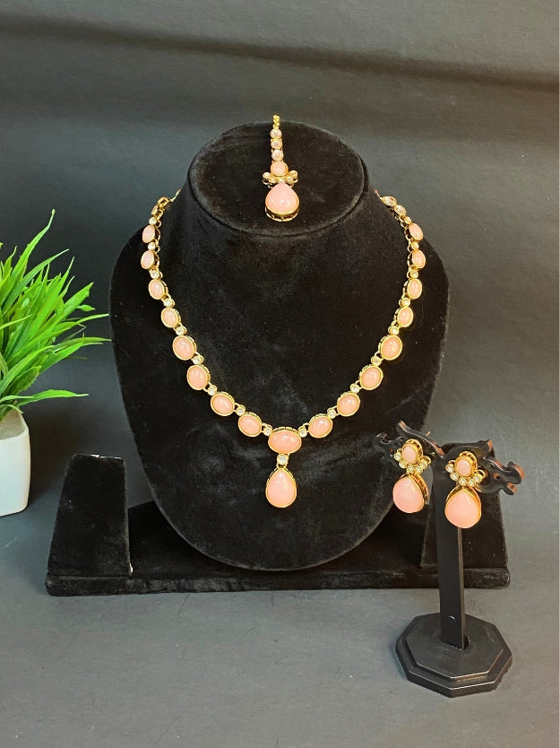 Elegant Pink Stone Gold-Plated Necklace, Earrings & Maang Tikka Jewellery Set