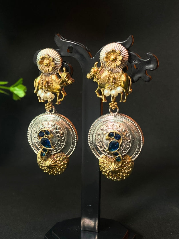 Traditional Oxidised Peacock & Cow Design Dangler Earrings with Pearl Detailing – Antique Gold & Silver Finish