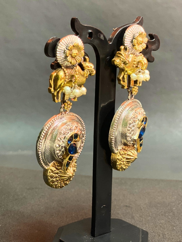 Traditional Oxidised Peacock & Cow Design Dangler Earrings with Pearl Detailing – Antique Gold & Silver Finish