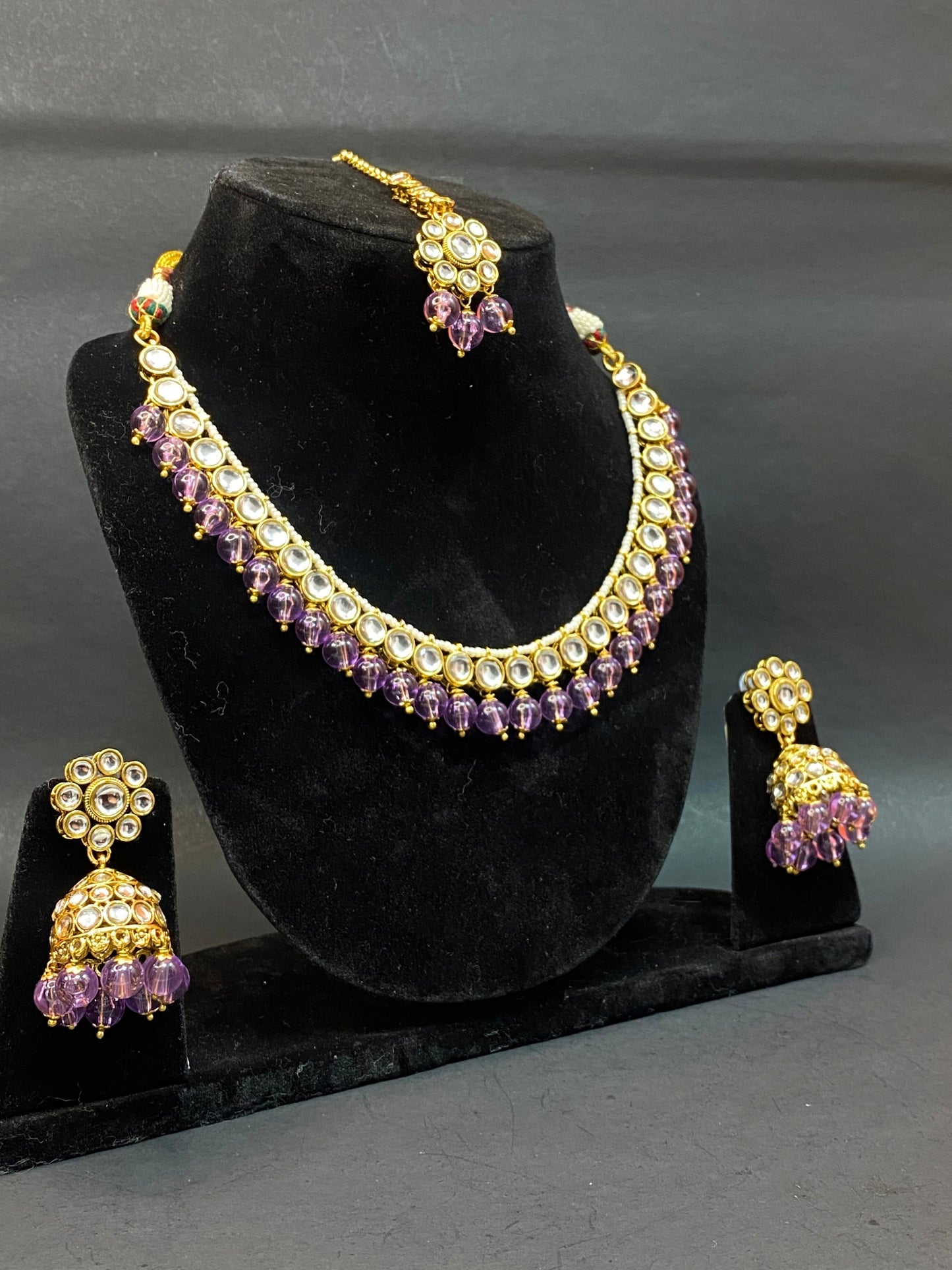 Traditional Kundan Jewellery Set with Jhumka & Purple Beads