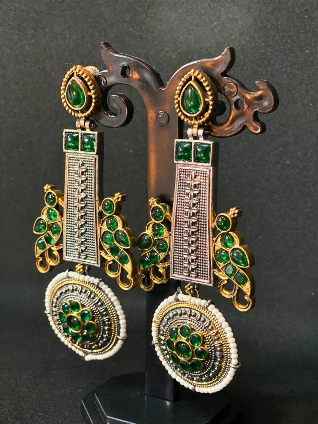 Oxidized Dual Tone Jhoomar Earrings with Green Kundan Stones