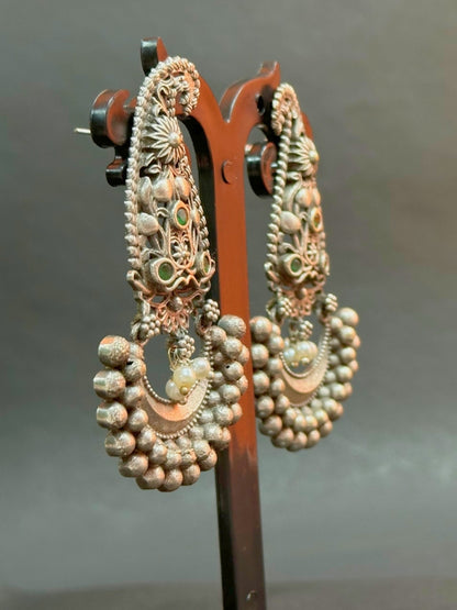 Oxidised Silver Jhumka Earrings with Silver Pearl & Green Stone Detailing