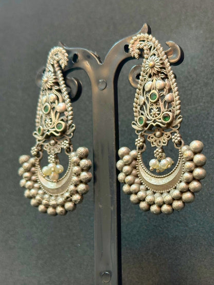 Oxidised Silver Jhumka Earrings with Silver Pearl & Green Stone Detailing