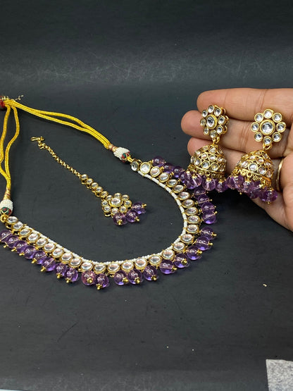 Traditional Kundan Jewellery Set with Jhumka & Purple Beads
