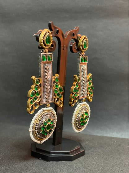 Oxidized Dual Tone Jhoomar Earrings with Green Kundan Stones
