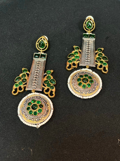 Oxidized Dual Tone Jhoomar Earrings with Green Kundan Stones