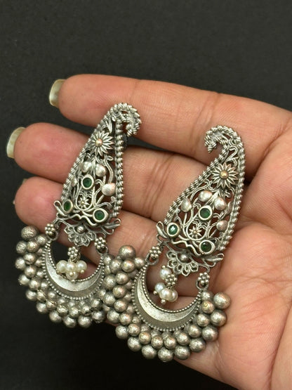 Oxidised Silver Jhumka Earrings with Silver Pearl & Green Stone Detailing