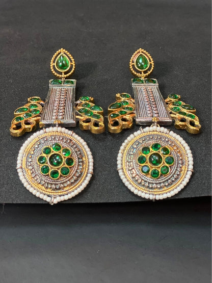 Oxidized Dual Tone Jhoomar Earrings with Green Kundan Stones