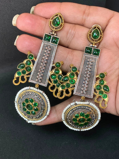 Oxidized Dual Tone Jhoomar Earrings with Green Kundan Stones